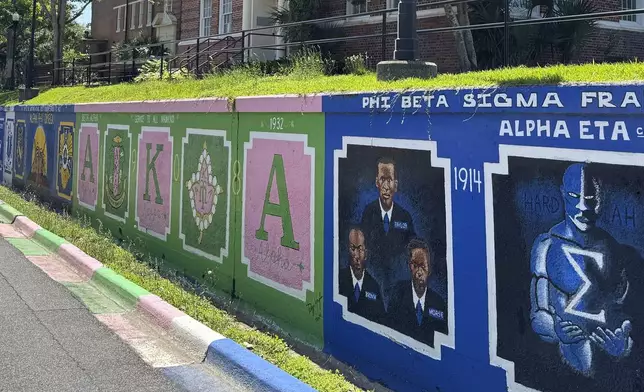 Murals celebrating historically Black fraternities and sororities decorate the campus of Florida AM University in Tallahassee, Fla., Wednesday, May 14, 2025. (AP Photo/Kate Payne)