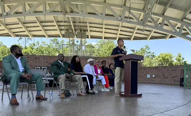 Elijah Hooks, a political science student at Florida AM University, speaks at a campus rally in Tallahassee, Fla., Wednesday, May 14, 2025, protesting the naming of an ally of Republican Gov. Ron DeSantis as one of the finalists to be FAMU's next president. (AP Photo/Kate Payne)