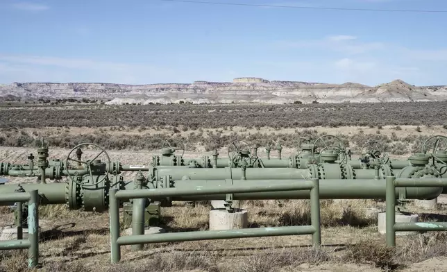 A view of natural gas pipes installed above ground in a field at a well pad in Counselor, N.M., Navajo Nation, on Tuesday March 11, 2025. (Nadav Soroker/Searchlight New Mexico via AP)