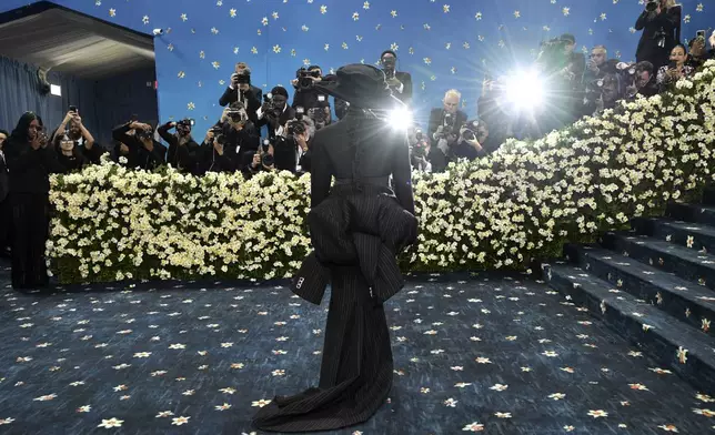Rihanna attends The Metropolitan Museum of Art's Costume Institute benefit gala celebrating the opening of the "Superfine: Tailoring Black Style" exhibition on Monday, May 5, 2025, in New York. (Photo by Evan Agostini/Invision/AP)