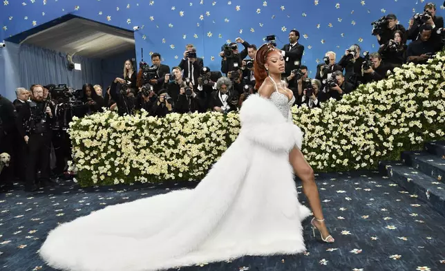 Megan Thee Stallion attends The Metropolitan Museum of Art's Costume Institute benefit gala celebrating the opening of the "Superfine: Tailoring Black Style" exhibition on Monday, May 5, 2025, in New York. (Photo by Evan Agostini/Invision/AP)
