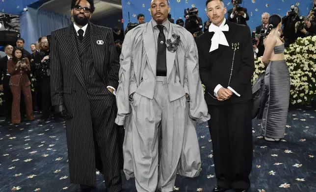 Dao-Yi Chow, from left Justin Jefferson and Maxwell Osborne attend The Metropolitan Museum of Art's Costume Institute benefit gala celebrating the opening of the "Superfine: Tailoring Black Style" exhibition on Monday, May 5, 2025, in New York. (Photo by Evan Agostini/Invision/AP)