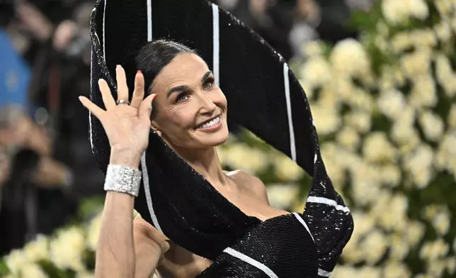 Demi Moore attends The Metropolitan Museum of Art's Costume Institute benefit gala celebrating the opening of the "Superfine: Tailoring Black Style" exhibition on Monday, May 5, 2025, in New York. (Photo by Evan Agostini/Invision/AP)