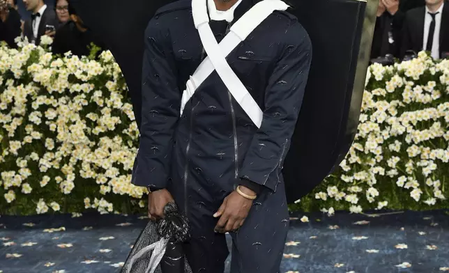 Andre 3000 attends The Metropolitan Museum of Art's Costume Institute benefit gala celebrating the opening of the "Superfine: Tailoring Black Style" exhibition on Monday, May 5, 2025, in New York. (Photo by Evan Agostini/Invision/AP)