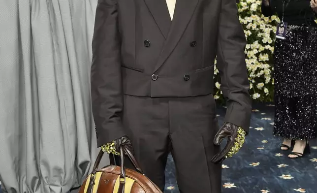 Bad Bunny attends The Metropolitan Museum of Art's Costume Institute benefit gala celebrating the opening of the "Superfine: Tailoring Black Style" exhibition on Monday, May 5, 2025, in New York. (Photo by Evan Agostini/Invision/AP)