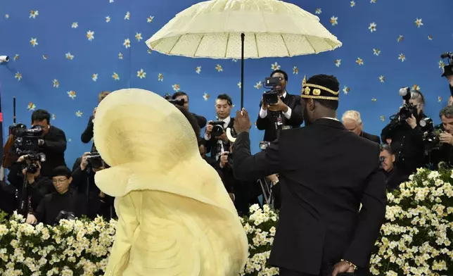 Lauryn Hill attends The Metropolitan Museum of Art's Costume Institute benefit gala celebrating the opening of the "Superfine: Tailoring Black Style" exhibition on Monday, May 5, 2025, in New York. (Photo by Evan Agostini/Invision/AP)