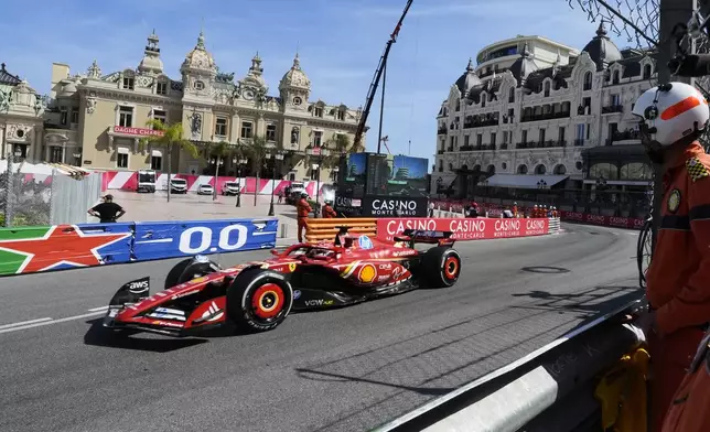 FILE - Ferrari driver Charles Leclerc of Monaco steers his car during the Formula One Monaco Grand Prix race at the Monaco racetrack, in Monaco, May 26, 2024. (AP Photo/Luca Bruno, File)