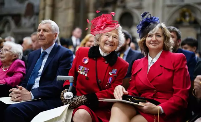 100-year-old veteran Dorothea Barron, centre, attends a Service of Thanksgiving at Westminster Abbey on V-E Day in London, Thursday, May 8, 2025. (Jordan Pettitt/Pool Photo via AP)
