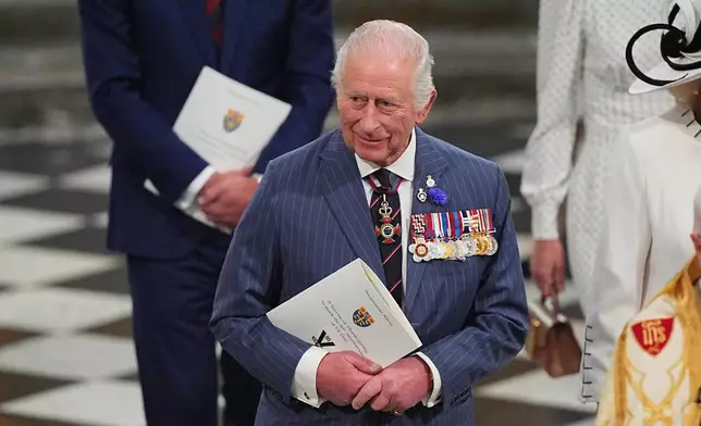 Britain's King Charles III leaves after attending a Service of Thanksgiving at Westminster Abbey on V-E Day in London, Thursday, May 8, 2025. (Aaron Chown/Pool Photo via AP)