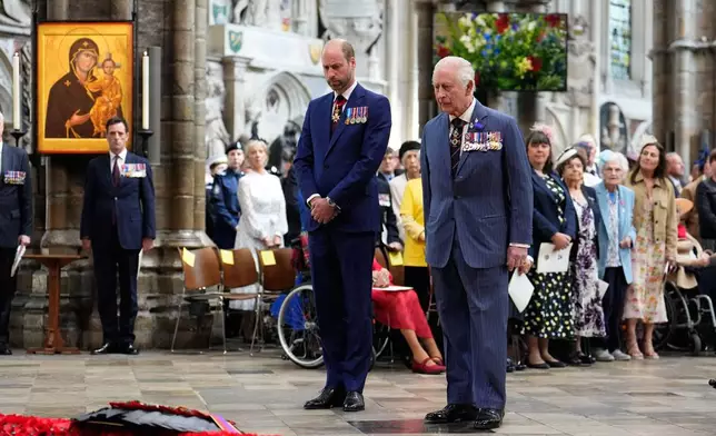 Britain's Prince William and King Charles III attend a Service of Thanksgiving at Westminster Abbey on V-E Day in London, Thursday, May 8, 2025. (Jordan Pettitt/Pool Photo via AP)