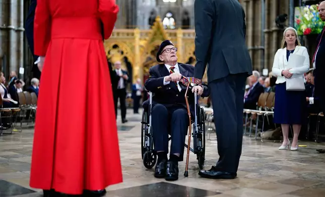 D-Day veteran Ken Hay arrives arrives to attend a Service of Thanksgiving at Westminster Abbey on V-E Day in London, Thursday, May 8, 2025. (Jordan Pettitt/Pool Photo via AP)