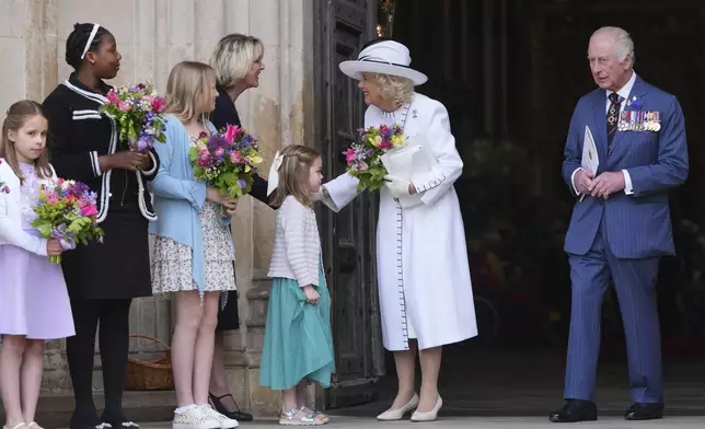 Britain's King Charles III and Queen Camilla leave after attending a Service of Thanksgiving at Westminster Abbey on V-E Day in London, Thursday, May 8, 2025.(AP Photo/Kirsty Wigglesworth)