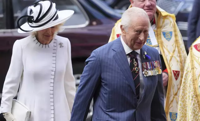 Britain's King Charles III and Queen Camilla arrive to attend a Service of Thanksgiving at Westminster Abbey on V-E Day in London, Thursday, May 8, 2025.(AP Photo/Kirsty Wigglesworth)