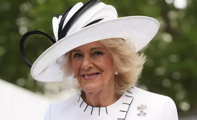 Britain's Queen Camilla leaves after attending a Service of Thanksgiving at Westminster Abbey on V-E Day in London, Thursday, May 8, 2025.(AP Photo/Kirsty Wigglesworth)
