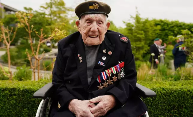 WW2 veteran Donald Rose, 110, poses for a photo at the National Memorial Arboretum, ahead of a memorial event hosted by the Royal British Legion to mark the 80th anniversary of V-E Day, in Alrewas, Staffordshire, England, Thursday, May 8, 2025. (Jacob King/PA via AP)