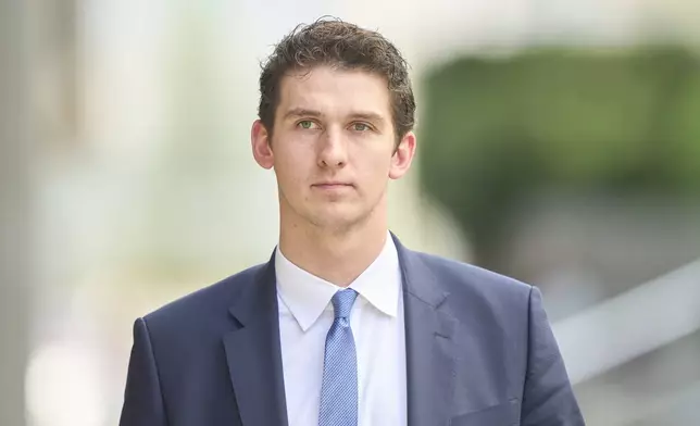 Cal Foote, one of five members of Canada’s 2018 world junior hockey team charged with sexual assault last year for an incident that allegedly took place in June 2018, leaves the London Courthouse in London, Ontario, Friday, May 2, 2025. (Geoff Robins/The Canadian Press via AP)