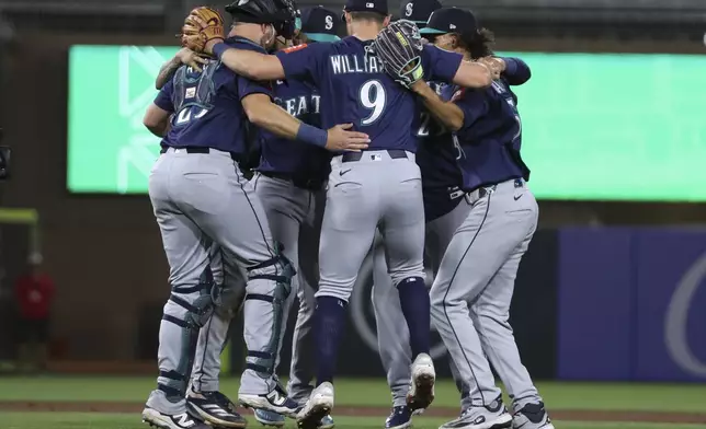 The Seattle Mariners celebrate their victory over the Athletics in a baseball game Tuesday, May 6, 2025, in West Sacramento, Calif. (AP Photo/Scott Marshall)