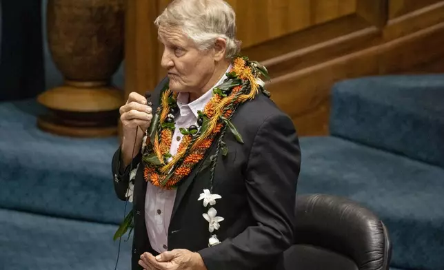 Hawaii Sen. Herbert "Tim" Richards III speaks during the discussion of the bill that will increase the state's lodging tax, Friday, May 2, 2025, at the state Capitol in Honolulu. (AP Photo/Mengshin Lin)