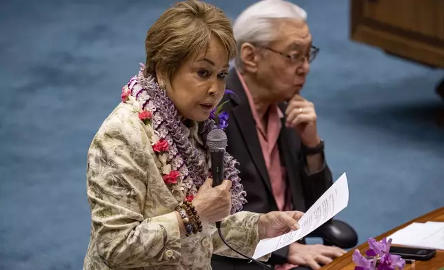 Hawaii Sen. Lorraine, R-Inouye, speaks during the discussion of the bill that will increase the state's lodging tax, Friday, May 2, 2025, at the state Capitol in Honolulu. (AP Photo/Mengshin Lin)