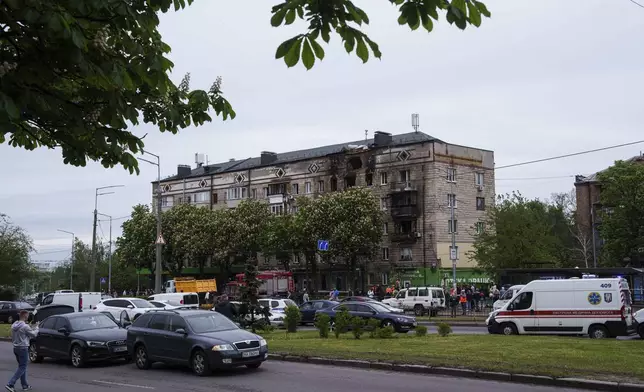 A residential building is seen damaged after a Russian strike in Kyiv, Ukraine, on Wednesday, May 7, 2025. (AP Photo/Evgeniy Maloletka)