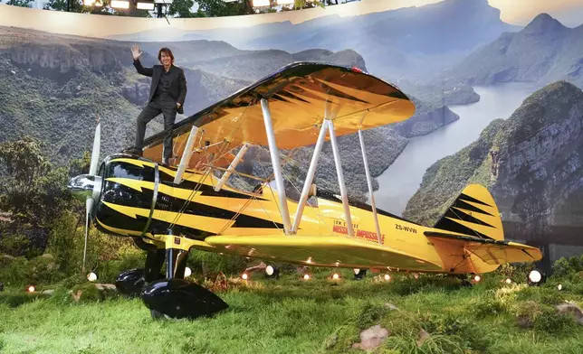Tom Cruise poses for photographers upon arrival at the premiere of the film 'Mission: Impossible - The Final Reckoning' on Thursday, May 15, 2025, in London. (Photo by Alberto Pezzali/Invision/AP)