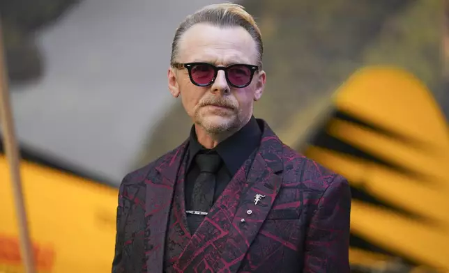 Simon Pegg poses for photographers upon arrival at the premiere of the film 'Mission: Impossible - The Final Reckoning' on Thursday, May 15, 2025, in London. (Photo by Alberto Pezzali/Invision/AP)