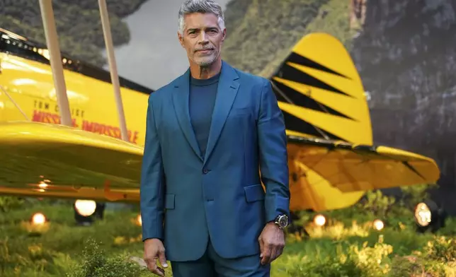 Esai Morales poses for photographers upon arrival at the premiere of the film 'Mission: Impossible - The Final Reckoning' on Thursday, May 15, 2025, in London. (Photo by Alberto Pezzali/Invision/AP)