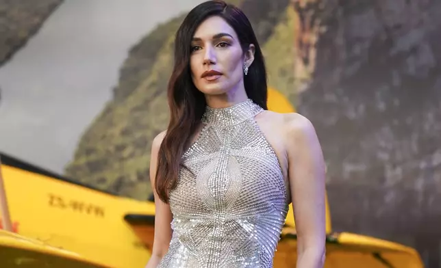 Mariela Garriga poses for photographers upon arrival at the premiere of the film 'Mission: Impossible - The Final Reckoning' on Thursday, May 15, 2025, in London. (Photo by Alberto Pezzali/Invision/AP)