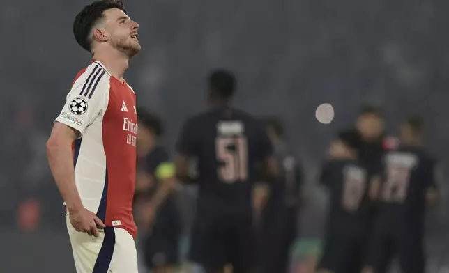 Arsenal's Declan Rice reacts after the Champions League semifinal, second leg soccer match between Paris Saint-Germain and Arsenal at the Parc des Princes in Paris, Wednesday, May 7, 2025. (AP Photo/Aurelien Morissard)