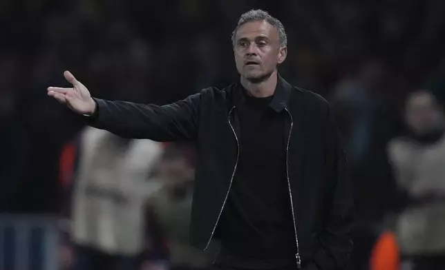 PSG's head coach Luis Enrique gestures during the Champions League semifinal, second leg soccer match between Paris Saint-Germain and Arsenal at the Parc des Princes in Paris, Wednesday, May 7, 2025. (AP Photo/Thibault Camus)