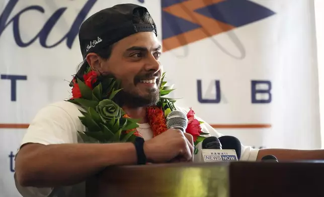 Oliver Widger, 29-year-old Oregon man who sailed from Oregon to Hawai, arrives at the Waikiki Yacht Club, on Saturday, May 24, 2025 in Waikiki, Hawaii. (AP Photo/Michelle Bir)