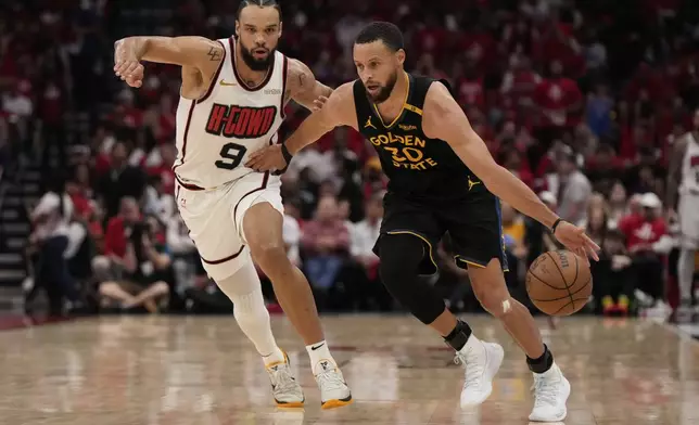 Houston Rockets' Dillon Brooks (9) defends against Golden State Warriors' Stephen Curry (30) during the second half of Game 7 of an NBA basketball first-round playoff series Sunday, May 4, 2025, in Houston. (AP Photo/Ashley Landis)