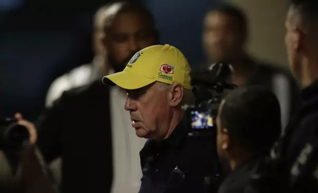 Brazil's new national soccer team head coach, Carlo Ancelotti, arrives at the international airport in Rio de Janeiro, Sunday, May 25, 2025. (AP Photo/Bruna Prado)