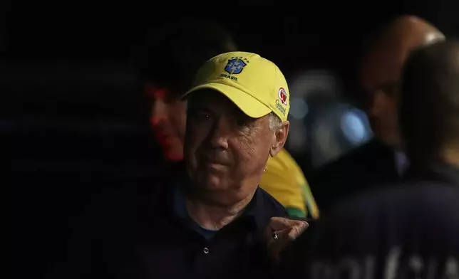 Brazil's new national soccer team head coach, Carlo Ancelotti, arrives at the international airport in Rio de Janeiro, Sunday, May 25, 2025. (AP Photo/Bruna Prado)