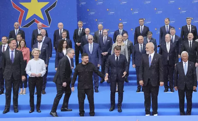The leaders of European countries and organizations pose for a family photo during the European Political Community summit in Tirana, Albania, Friday, May 16, 2025. (AP Photo/Vlasov Sulaj)