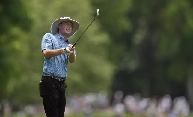 Joe Highsmith hits from the fairway on the second hole during the final round of the PGA Championship golf tournament at the Quail Hollow Club, Sunday, May 18, 2025, in Charlotte, N.C. (AP Photo/George Walker IV)