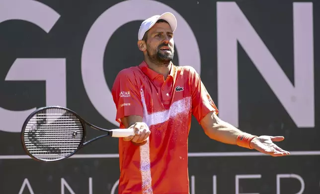 Novak Djokovic of Serbia reacts during the final match of the ATP 250 Geneva Open tennis against Hubert Hurkacz of Poland, in Geneva, Switzerland, Saturday, May 24, 2025. (Martial Trezzini/Keystone via AP)