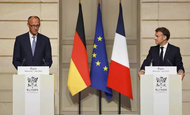 German Chancellor Friedrich Merz, left, and French President Emmanuel Macron attend a joint press conference following their meeting at the Elysee palace in Paris Wednesday, May 7, 2025.(Ludovic Marin, Pool via AP)