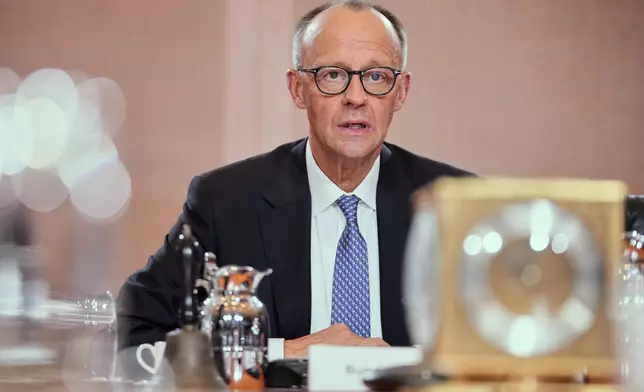 Newly-elected German Chancellor Friedrich Merz attends the first cabinet meeting, at the chancellery in Berlin, Germany, Tuesday, May 6, 2025. (AP Photo/Ebrahim Noroozi)