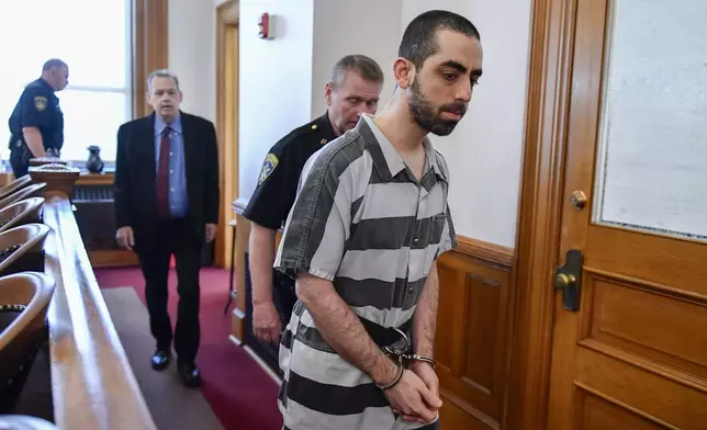 Hadi Matar walks in to the Chautauqua County court in Mayville, N.Y., Friday, May. 16, 2025. (AP Photo/Adrian Kraus)