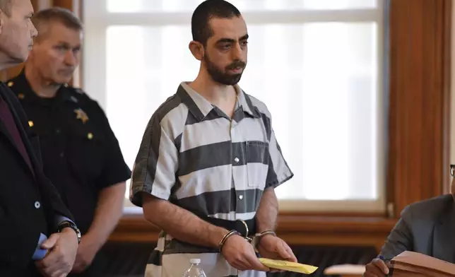 Hadi Matar, center, addresses the court in Chautauqua County court in Mayville, N.Y., Friday, May. 16, 2025. (AP Photo/Adrian Kraus)