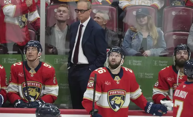 Florida Panthers head coach Paul Maurice reacts during the third period in Game 4 of the NHL hockey Stanley Cup Eastern Conference finals against the Carolina Hurricanes, Monday, May 26, 2025, in Sunrise, Fla. (AP Photo/Lynne Sladky)