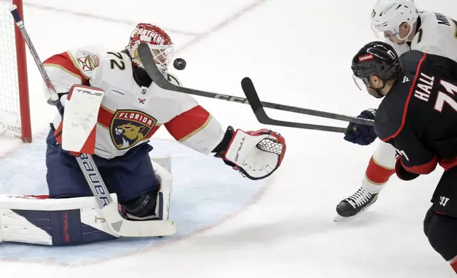 Carolina Hurricanes left wing Taylor Hall (71) shoots against Florida Panthers goaltender Sergei Bobrovsky (72) during the first Period in Game 5 of the NHL hockey Stanley Cup Eastern Conference finals Wednesday, May 28, 2025, in Raleigh, N.C. (AP Photo/Chris Seward)