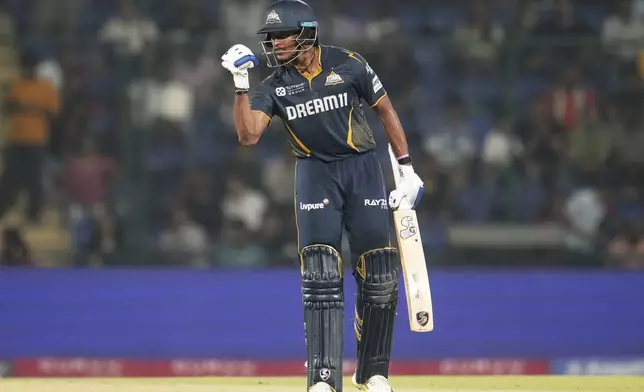 Gujarat Titans' Sai Sudharsan celebrates after scoring a century during the Indian Premier League cricket match between Delhi Capitals and Gujarat Titans at Arun Jaitley Stadium in New Delhi, India, Monday, May 19, 2025. (AP Photo/Manish Swarup)
