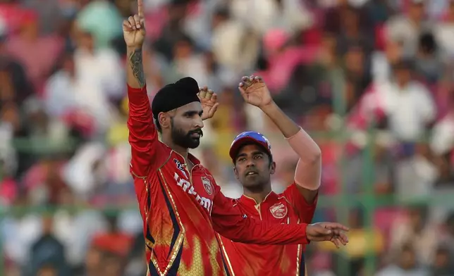 Punjab Kings' Harpreet Brar celebrates the wicket of Rajasthan Royals' Riyan Parag during the Indian Premier League cricket match between Rajasthan Royals and Punjab Kings at Sawai Mansingh Stadium in Jaipur, India, Sunday, May 18, 2025. (AP Photo/Surjeet Yadav)