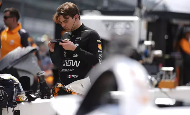 Pato O'Ward, of Mexico, prepares to drive during practice for the Indianapolis 500 auto race at Indianapolis Motor Speedway in Indianapolis, Wednesday, May 14, 2025. (AP Photo/Michael Conroy)
