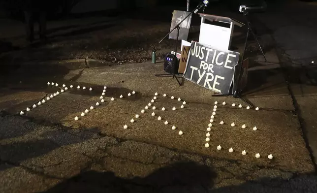 FILE - Candles spell out the name of Tyre Nichols during a candlelight vigil for Nichols on the anniversary of his death, Jan. 7, 2024, in Memphis. (AP Photo/Karen Pulfer Focht, file)