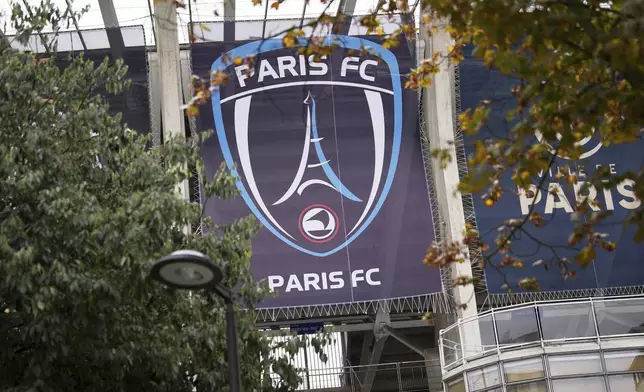 FILE - The Paris FC soccer club banner is seen outside the Charlety stadium in Paris, France, Thursday, Oct.17, 2024. (AP Photo/Thibault Camus, File)