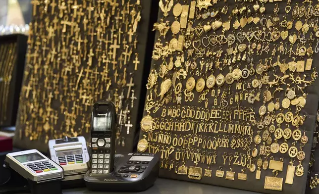 Gold jewelry are displayed for sale at V&amp;P Jewelry in the St. Vincent Jewelry Center in the Jewelry District of Los Angeles in Los Angeles, Wednesday, April 30, 2025. (AP Photo/Jae C. Hong)