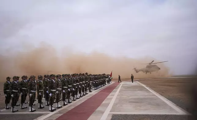Members of the Moroccan Royal Armed Forces stand guard as they take part in the 21st edition of the African Lion military exercise, in Tantan, south of Agadir, Morocco, Friday, May 23, 2025. (AP Photo/Mosa'ab Elshamy)